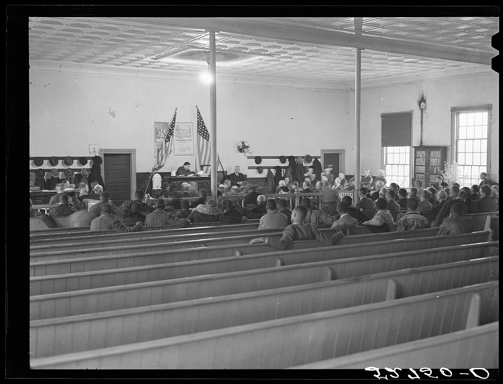 Interior of a county courthouse courtroom during an active trial in Oxford, North Carolina